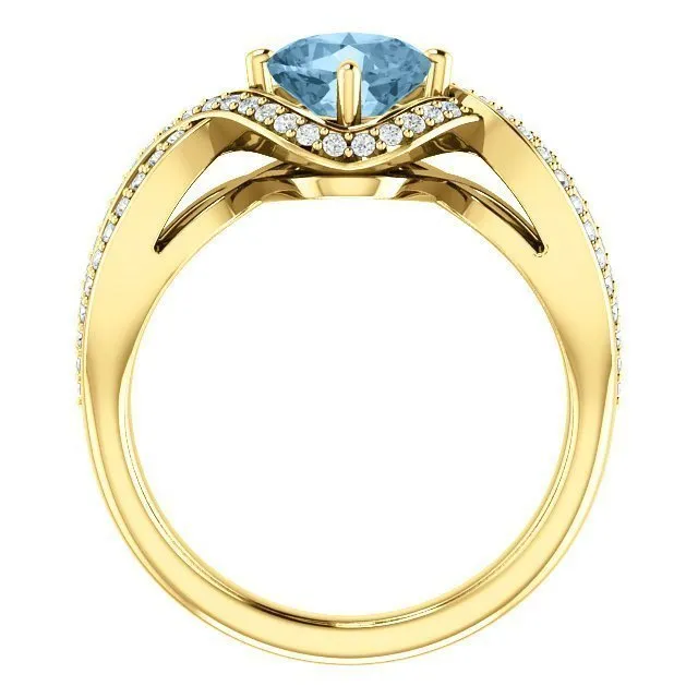 14KT GOLD 1.25 CT SKY BLUE TOPAZ & 1/3 CTW DIAMOND TWIST RING